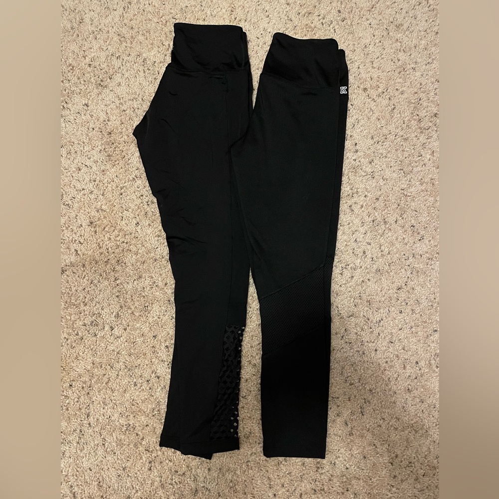 2 pair of PINK VS black leggings with mesh. Great condition both size medium!